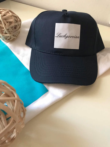 Blue cap for sale with a white flock logo